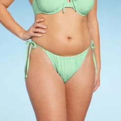 Women's Side-Tie Low-Rise High Leg Adjustable Lurex Bikini Bottom - Wild Fable™ 9 Women's Side-Tie Low-Rise High Leg Adjustable Lurex Bikini Bottom - Wild Fable™ -Thredup Fashion Shop GUEST 03da585c 0255 4409 8704 571a861ba24c