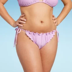 Women's Ruffle Side-Tie Adjustable Coverage Bikini Bottom - Wild Fable™ 11 Women's Ruffle Side-Tie Adjustable Coverage Bikini Bottom - Wild Fable™ -Thredup Fashion Shop GUEST 14edd9f2 a491 4484 be9f e6a51628348d