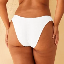 Women's Extra High Leg Eyelet Low-Rise Extra Cheeky Bikini Bottom - Wild Fable™ 9 Women's Extra High Leg Eyelet Low-Rise Extra Cheeky Bikini Bottom - Wild Fable™ -Thredup Fashion Shop GUEST 18b016bc 6c93 4100 b5eb 48b96f1a45fe