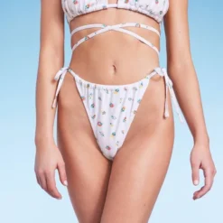 Women's Floral Print Side-Tie Ultra High Leg Adjustable Coverage Bikini Bottom - Wild Fable™ White 15 Women's Floral Print Side-Tie Ultra High Leg Adjustable Coverage Bikini Bottom - Wild Fable™ White -Thredup Fashion Shop GUEST 4400ff04 b52e 42fd bde2 19d3bea06cd1