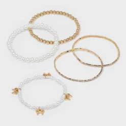Beaded And Pearl Bow Charm Bracelet Set 5pc - Wild Fable™ Gold 9 Beaded And Pearl Bow Charm Bracelet Set 5pc - Wild Fable™ Gold -Thredup Fashion Shop GUEST 69495807 688c 4cf0 ace8 4c6cb52a8740