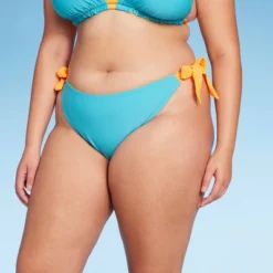 Women's Reversible Side-Tie High Leg Cheeky Bikini Bottom - Wild Fable™ 26 Women's Reversible Side-Tie High Leg Cheeky Bikini Bottom - Wild Fable™ -Thredup Fashion Shop GUEST 77467828 c896 481d bb3b 24b2ec704c16