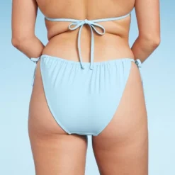 Women's Side-Tie Low-Rise High Leg Adjustable Bikini Bottom - Wild Fable™ Blue 10 Women's Side-Tie Low-Rise High Leg Adjustable Bikini Bottom - Wild Fable™ Blue -Thredup Fashion Shop GUEST 924af3bc 7a86 4a95 8319 2249382b46e6