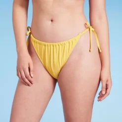 Women's Side-Tie Ultra High Leg Adjustable Coverage Bikini Bottom - Wild Fable™ Yellow 14 Women's Side-Tie Ultra High Leg Adjustable Coverage Bikini Bottom - Wild Fable™ Yellow -Thredup Fashion Shop GUEST 9f93be20 36fa 4a1d 8e8f ec05d2d6fa7c