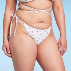 Women's Floral Print Side-Tie Ultra High Leg Adjustable Coverage Bikini Bottom - Wild Fable™ White 11 Women's Floral Print Side-Tie Ultra High Leg Adjustable Coverage Bikini Bottom - Wild Fable™ White -Thredup Fashion Shop GUEST a76abeab 66b2 4843 943b d7f414064e80