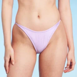 Women's Side Tab High Leg Cheeky Bikini Bottom - Wild Fable™ Shiny Light Purple 15 Women's Side Tab High Leg Cheeky Bikini Bottom - Wild Fable™ Shiny Light Purple -Thredup Fashion Shop GUEST ce65d285 d1ae 4fe5 b711 a3b9b598342f