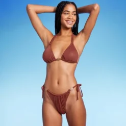 Women's Side-Tie Adjustable Extra High Leg Lurex Plisse Textured Bikini Bottom - Wild Fable™ 11 Women's Side-Tie Adjustable Extra High Leg Lurex Plisse Textured Bikini Bottom - Wild Fable™ -Thredup Fashion Shop GUEST d8038ba8 ad40 41a1 b584 591c53972fda