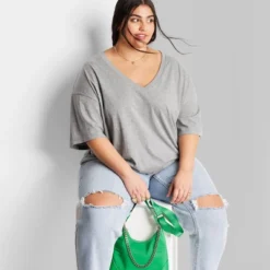 Women's Short Sleeve Relaxed Fit V-Neck T-Shirt - Wild Fable™ 11 Women's Short Sleeve Relaxed Fit V-Neck T-Shirt - Wild Fable™ -Thredup Fashion Shop GUEST de2f8a46 b446 4432 bdf2 c15fe5d5e799