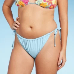 Women's Side-Tie Low-Rise High Leg Adjustable Bikini Bottom - Wild Fable™ Blue 9 Women's Side-Tie Low-Rise High Leg Adjustable Bikini Bottom - Wild Fable™ Blue -Thredup Fashion Shop GUEST faf78473 1eb6 4b9c a249 d1eadc200643